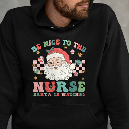 Funny Nurse Shirt, Nurse Unisex T-Shirt/Hoodie/Sweatshirt HLT00 - Nurse Christmas Shirt Be Nice To The Nurse Santa Is Watching T-Shirt